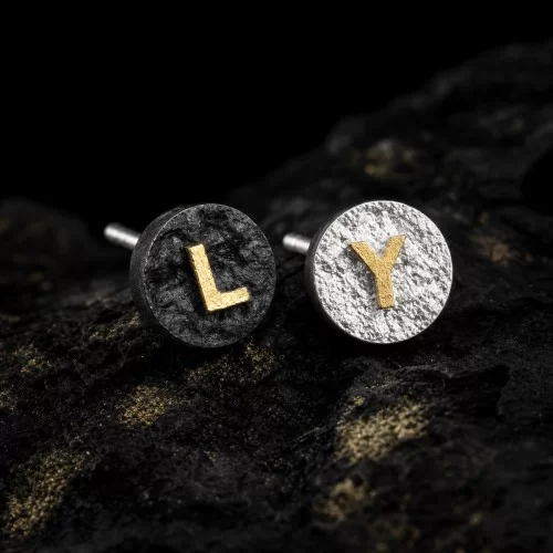 Personalized sterling silver initial stud earring with a brass letter inlay