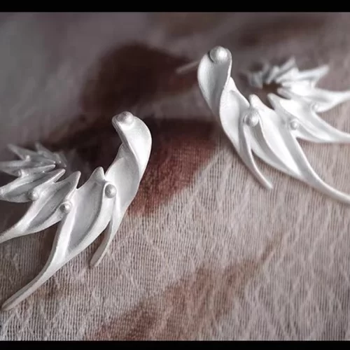 Pair of satin-finished sterling silver bird ear climbers