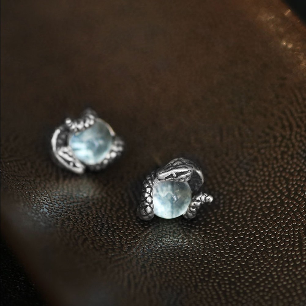 Blue topaz snake stud earrings in 925 sterling silver