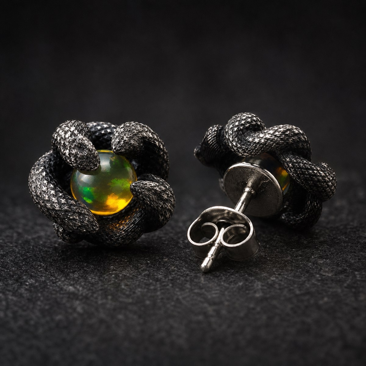 Post and back detail of an oxidized silver opal stud earring
